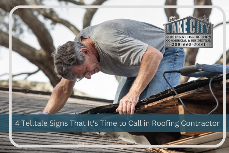 Homeowner inspecting roof damage, realizing a DIY fix won't cut it.