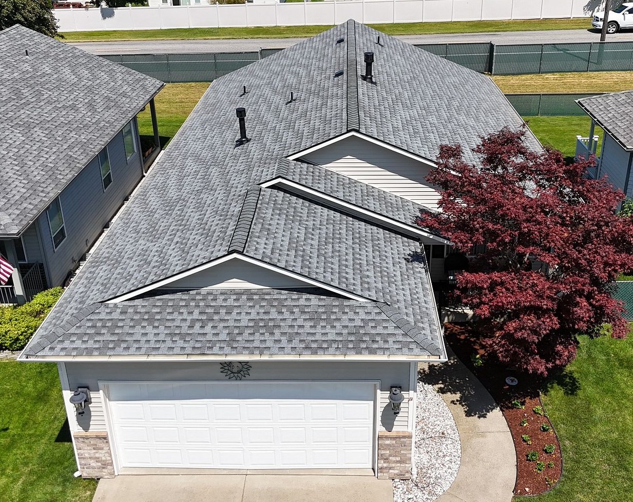 New black shingles installed on a home by Lake City Roofing