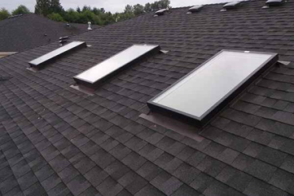 Close up of a skylights installed on a residential roof by Lake City Roofing